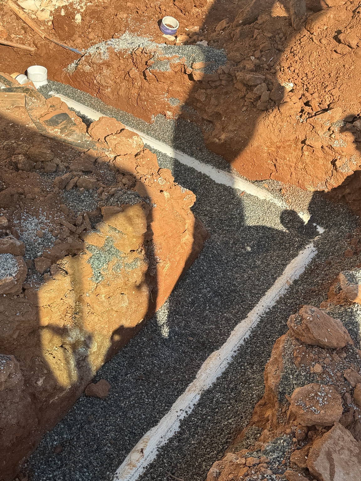 Septic drain field trench installation